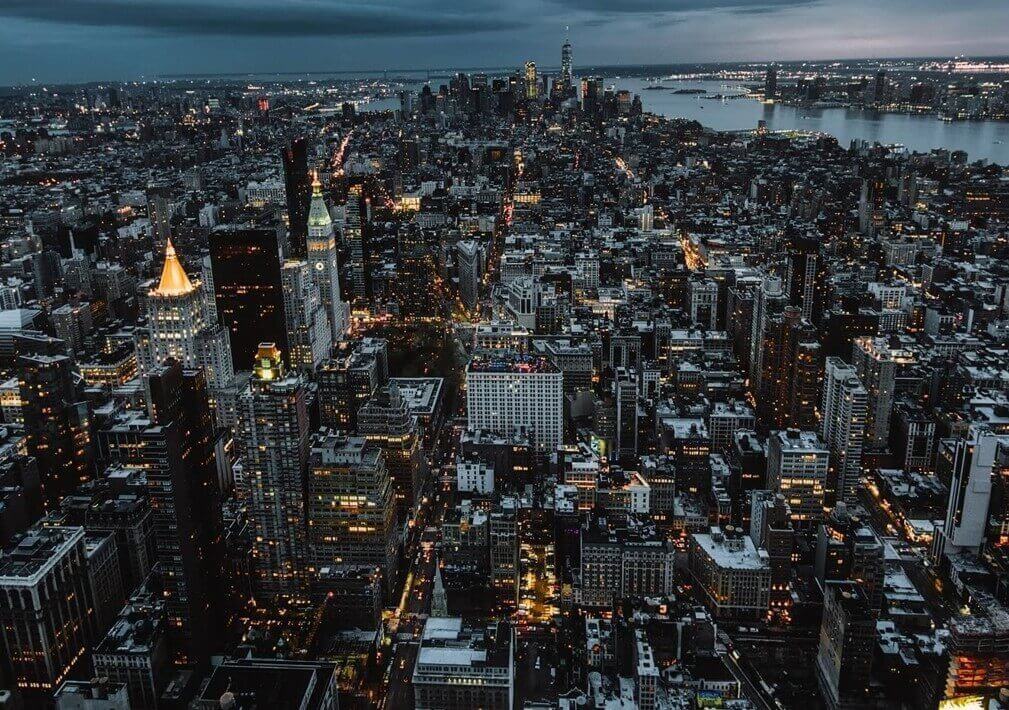 city buildings under a blue sky