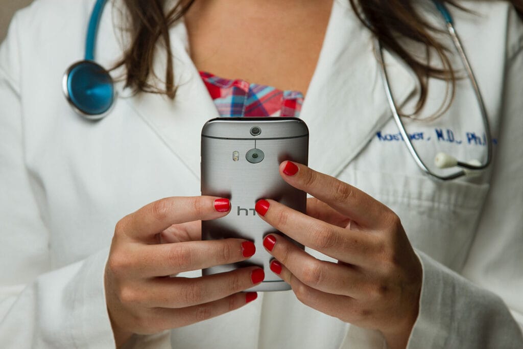 doctor holding a smartphone