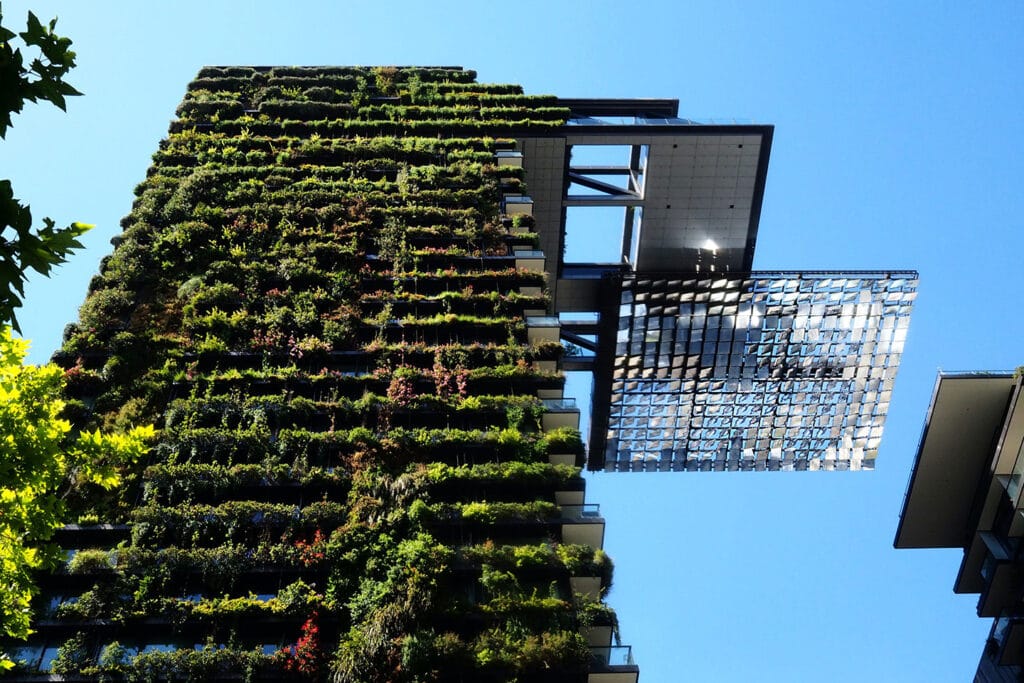 modern city building with plants growing on it
