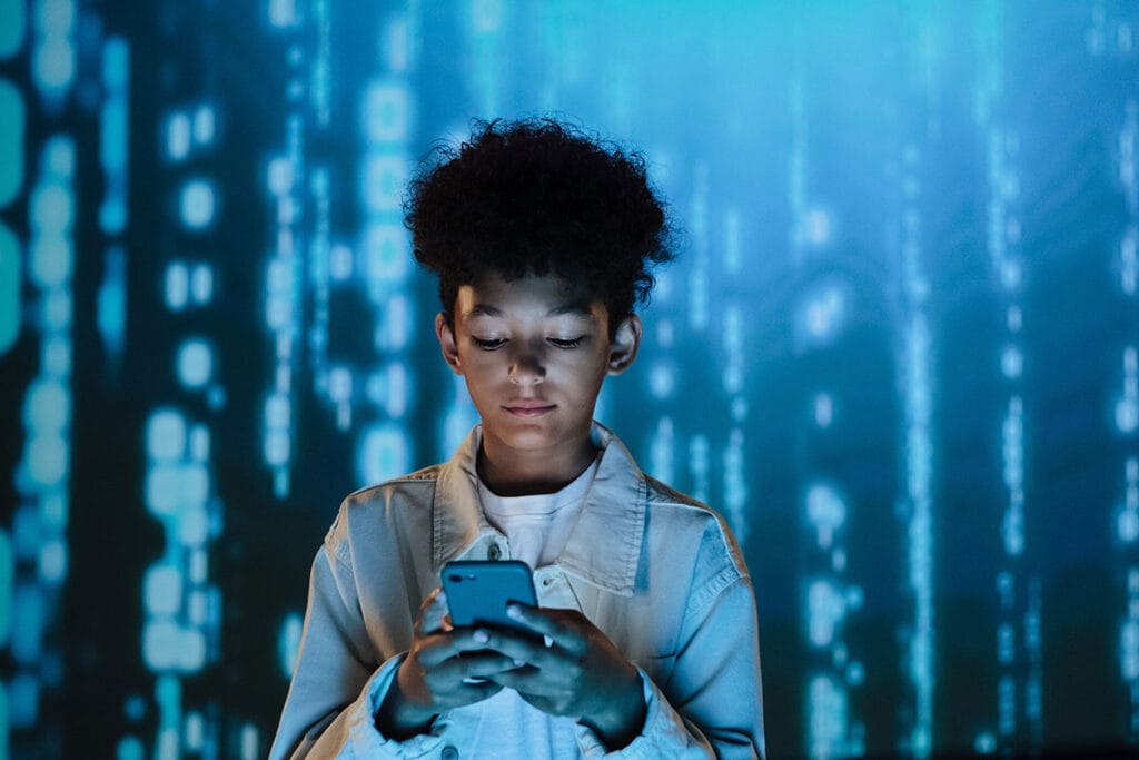 boy using mobile phone