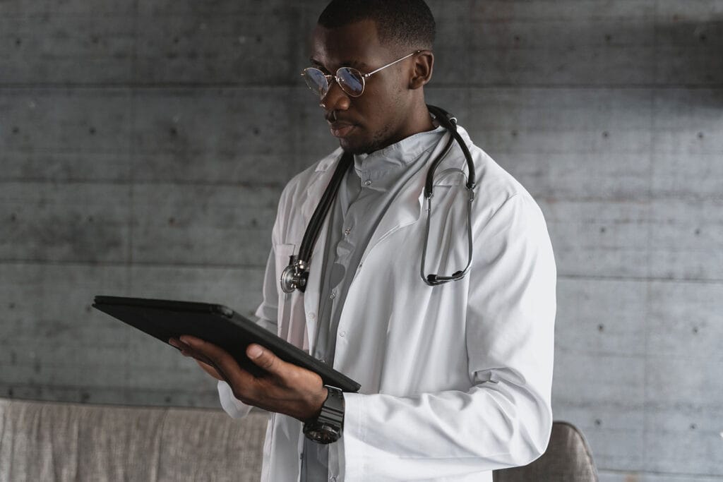 doctor holding a tablet