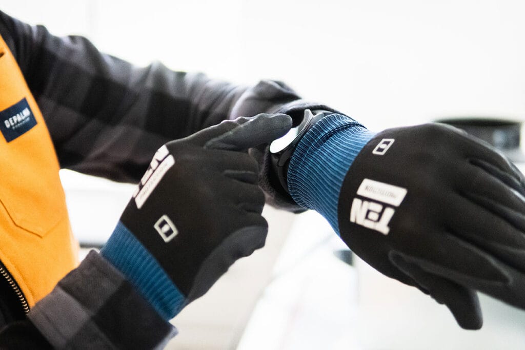 construction worker using smart watch